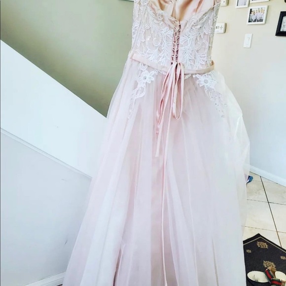 Beautiful sheer white with hints of pink prom dress never worn. Size 4 - Picture 13 of 15